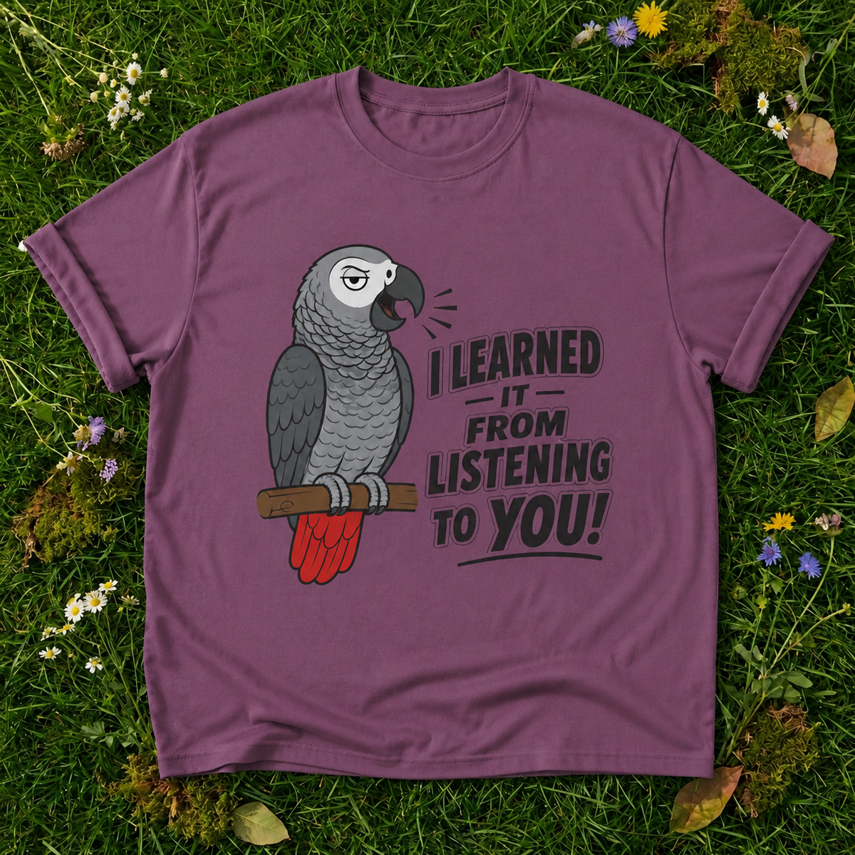 I Learned It From Listening to You Parrot T-Shirt in Berry on grass
