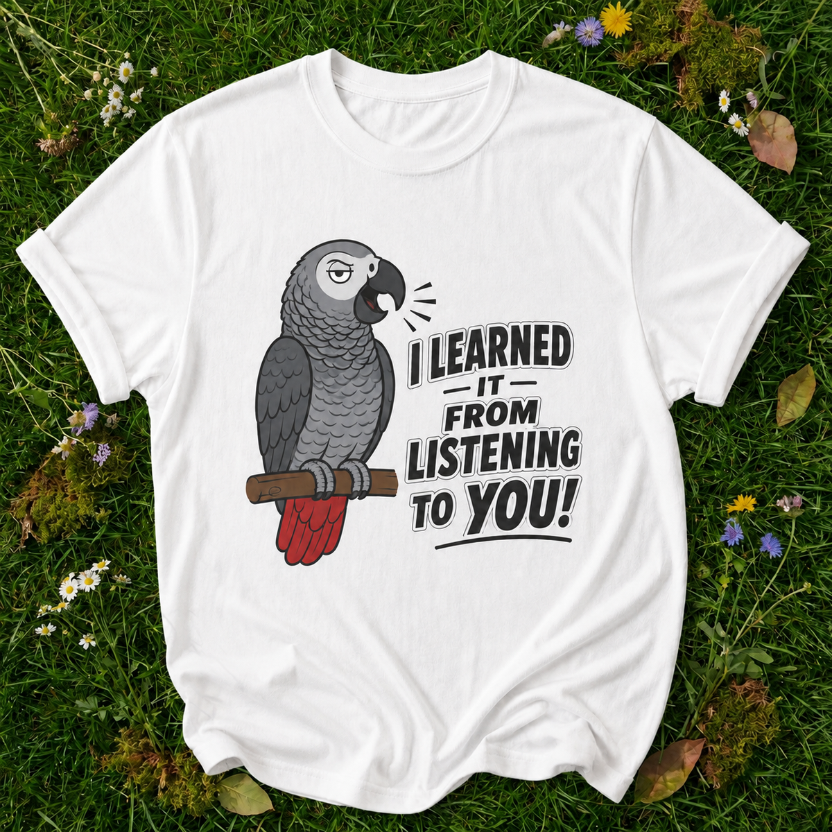 I Learned It From Listening to You Parrot T-Shirt in White on grass